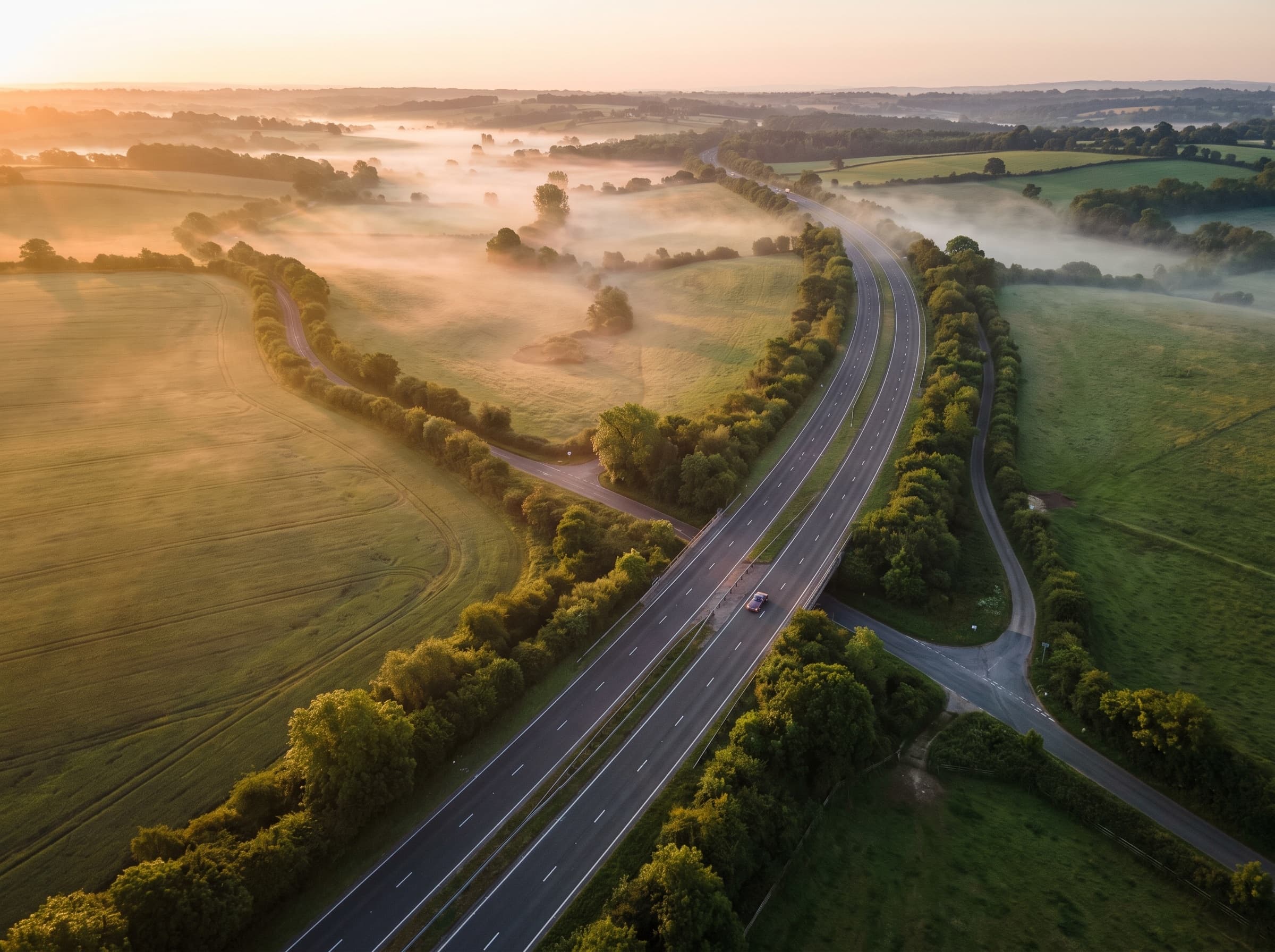 Aerial view of Surrey country roads at sunrise